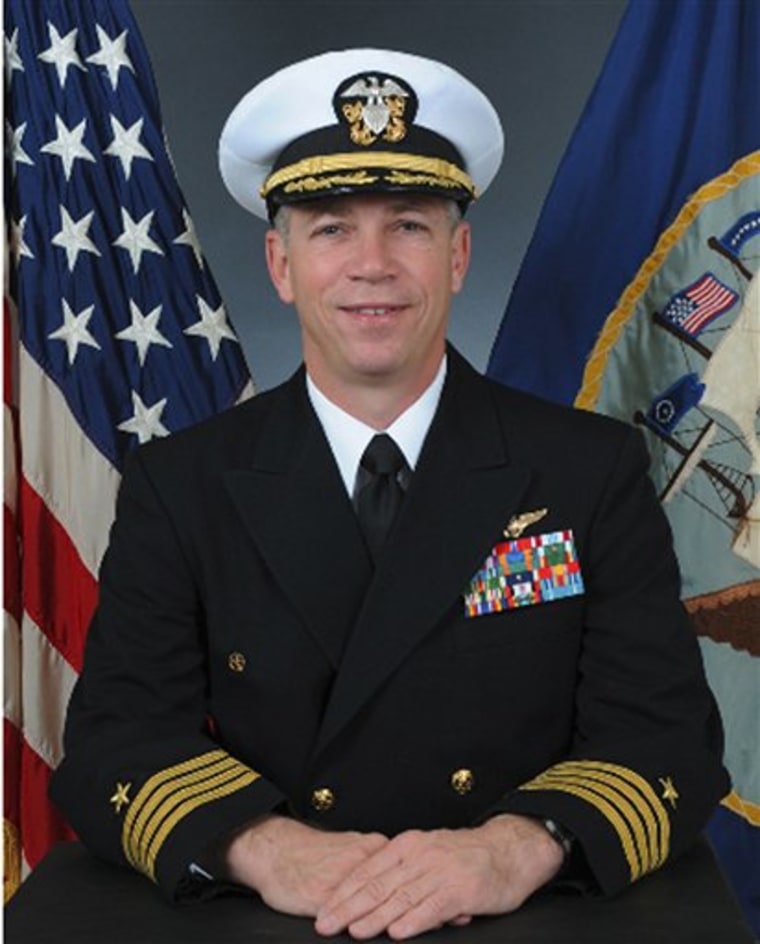In this undated photo released by the U.S. Navy, Navy Capt. Owen Honors is shown in an official portrait. The top officer aboard a nuclear-powered aircraft carrier broadcast to his crew a series of profanity-laced comedy sketches in which he uses gay slurs, mimics masturbation and opens the shower curtain on women pretending to bathe together, a newspaper reported. The Virginian-Pilot reported in its Sunday editions that Capt. Honors appeared in the videos in 2006 and 2007 while he was the USS Enterprise's second-ranking officer, and showed them across the ship on closed-circuit television. He took over as the ship's commander in May. (AP Photo/US Navy)